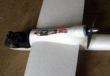 Top of plane with camerea, ESC (electronic speed control), and upgraded brushless motor