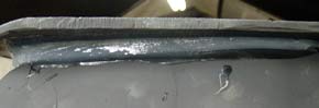Plate pressed on with weight. Excessive overflow smoothed away